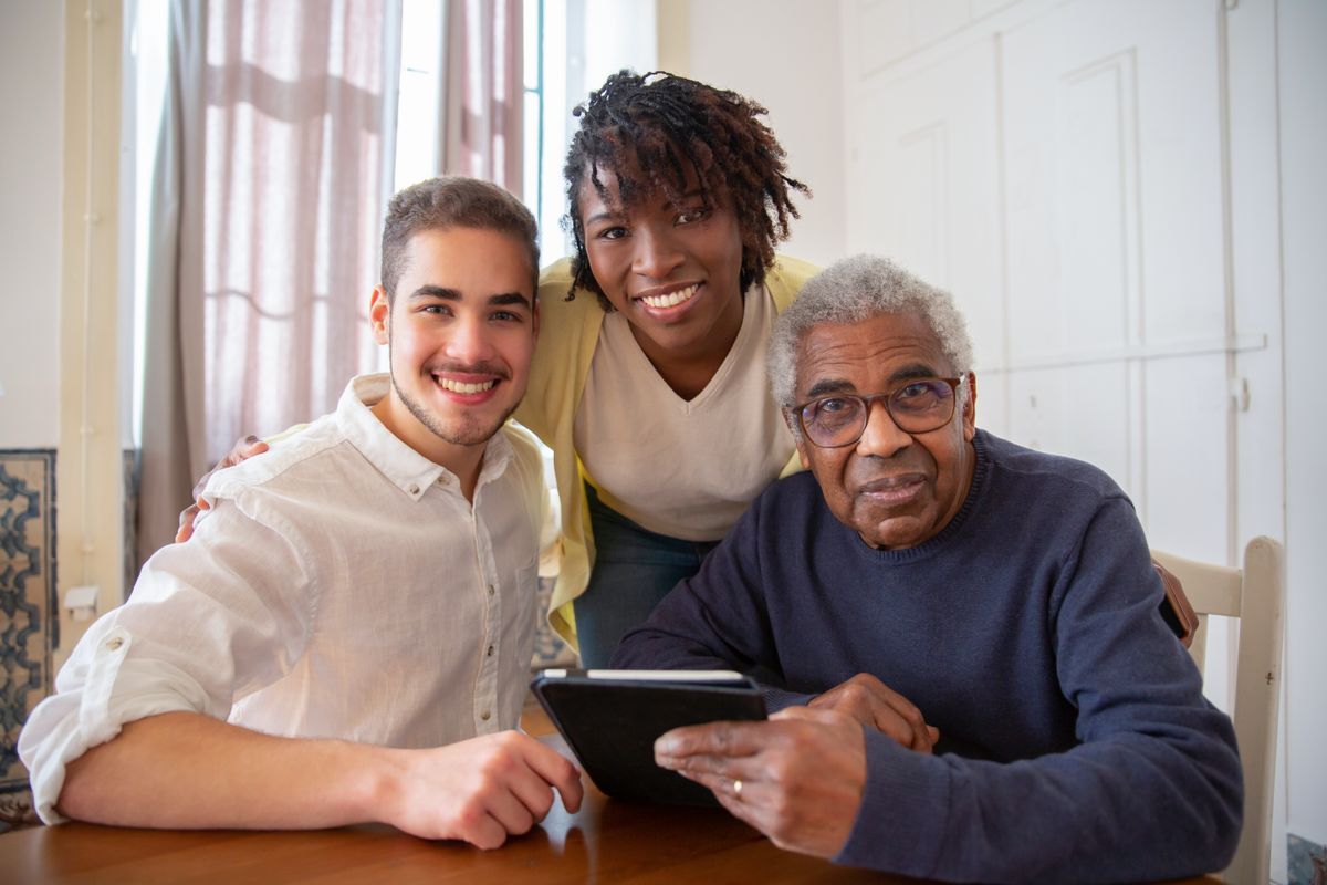 An older man with family during a quiet afternoon